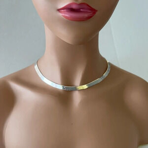 Sterling Silver made in Italy Necklace.  Gorgeous cuts on one smooth on other.